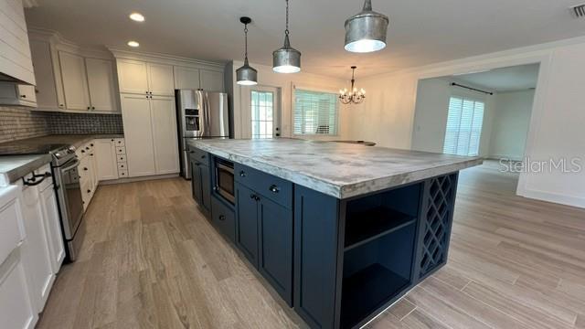Stunning 5 bedroom 3 bath pool home with fenced yard and inground pool on oversized lot property image