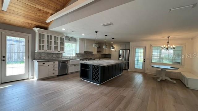 Stunning 5 bedroom 3 bath pool home with fenced yard and inground pool on oversized lot property image
