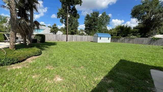 Stunning 5 bedroom 3 bath pool home with fenced yard and inground pool on oversized lot property image