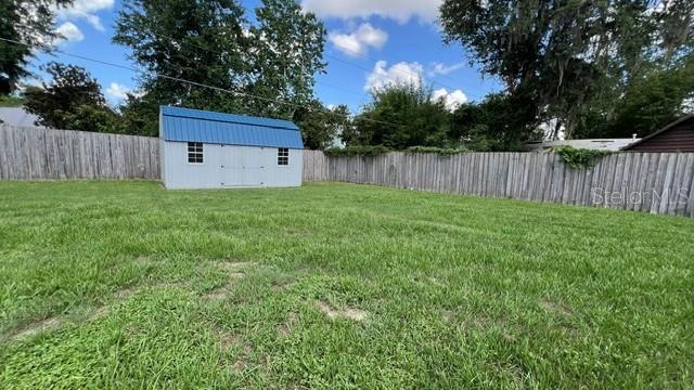 Stunning 5 bedroom 3 bath pool home with fenced yard and inground pool on oversized lot property image